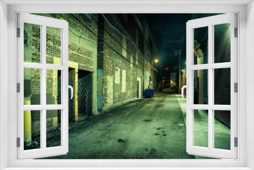 Fototapeta Naklejka Na Ścianę Okno 3D - Dark and eerie urban city alley at night 