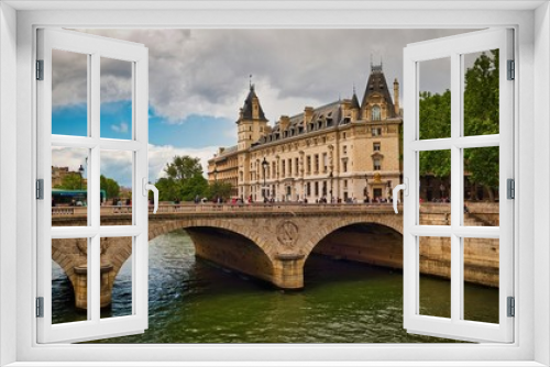 Fototapeta Naklejka Na Ścianę Okno 3D - Bridge Pont Saint-Michel across Seine River and beautiful historic buildings of Paris