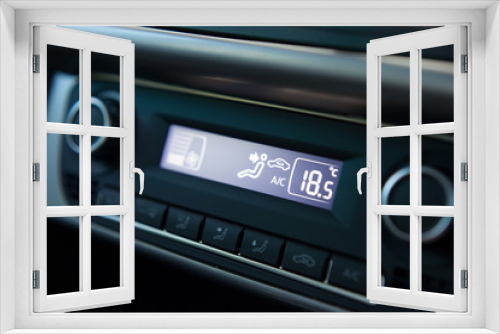 Close up shot of modern car digital climate control panel