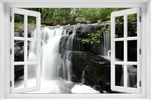 Fototapeta Naklejka Na Ścianę Okno 3D - Waterfall in a park