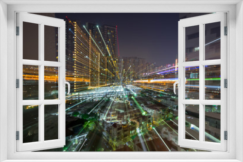 Fototapeta Naklejka Na Ścianę Okno 3D - Blurred abstract background of light lines from the capital's residences in condominiums, offices, street lights from shopping malls, nighttime beauty