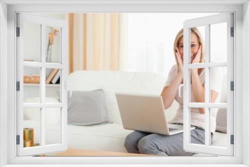 Happy woman with a laptop