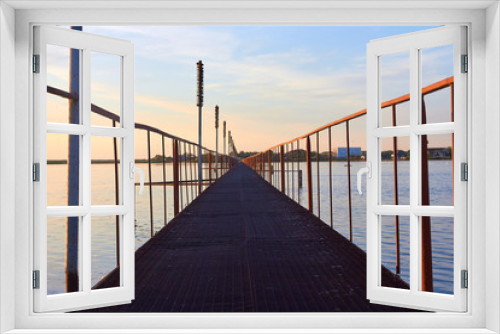 Fototapeta Naklejka Na Ścianę Okno 3D - Iron footbridge over the lake