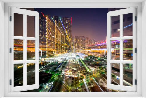 Fototapeta Naklejka Na Ścianę Okno 3D - Blurred abstract background of light lines from the capital's residences in condominiums,offices, street lights from shopping malls, nighttime beauty