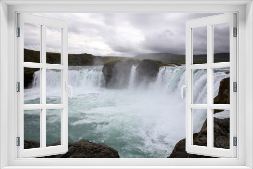 Fototapeta Naklejka Na Ścianę Okno 3D - Godafoss / Iceland - August 26, 2017: The Godafoss waterfall, Iceland, Europe