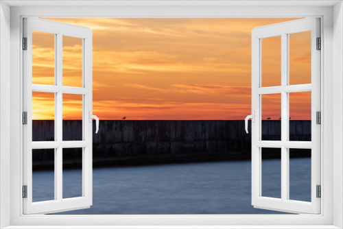 Fototapeta Naklejka Na Ścianę Okno 3D - sunset in the baltic sea overlooking the pier