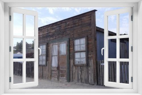 Fototapeta Naklejka Na Ścianę Okno 3D - Wooden structures in Randsburg, one of the gold mining ghost towns in California.