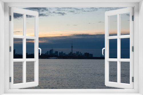 Fototapeta Naklejka Na Ścianę Okno 3D - Sunrise over Toronto Downtown near Lake Ontario in Canada