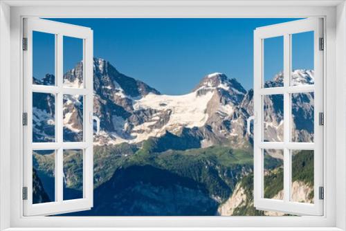 Fototapeta Naklejka Na Ścianę Okno 3D - Switzerland, Panoramic view on Murren and green Alps around