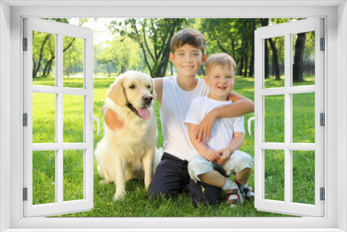 Fototapeta Naklejka Na Ścianę Okno 3D - Two brothers in the park with a dog