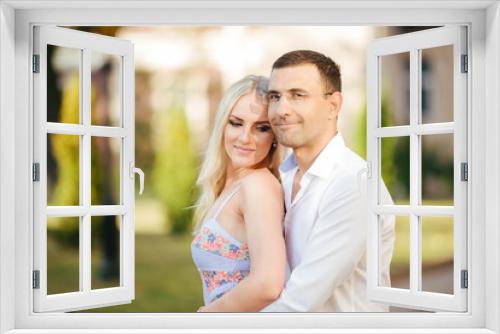 Smiling couple in love outdoors, lviv. summer