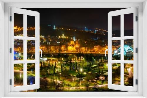 Fototapeta Naklejka Na Ścianę Okno 3D - Panoramic nightscape view of Tbilisi old town and Rike park. Romantic Gerogia and main tourist atrractions. Tbilisi. Sakartvelo.25.03.2020