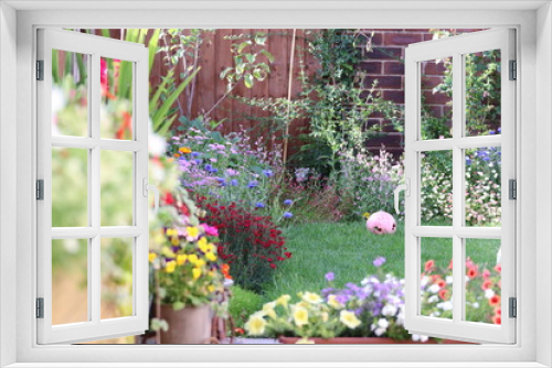 Fototapeta Naklejka Na Ścianę Okno 3D - flowers in garden