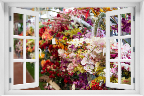 Fototapeta Naklejka Na Ścianę Okno 3D - Flowers on display in shop