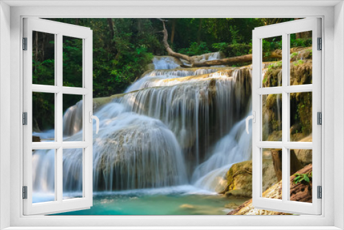 Fototapeta Naklejka Na Ścianę Okno 3D - The beautiful Erawan cascade waterfall with turquoise water like heaven at the tropical forest ,Kanchanaburi Nation Park, Thailand