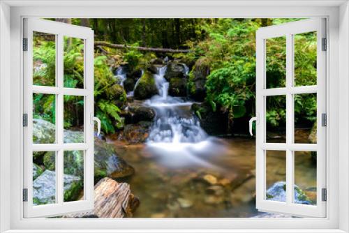 Fototapeta Naklejka Na Ścianę Okno 3D - Photography of a long exposure waterfall in the forest