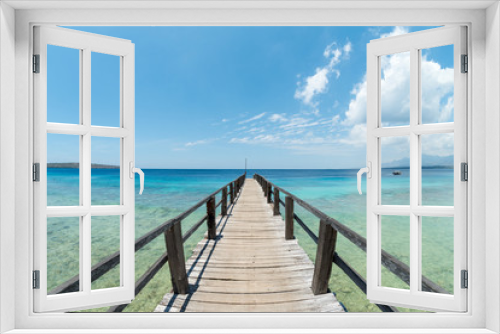 Fototapeta Naklejka Na Ścianę Okno 3D - The clear blue sea and the pier