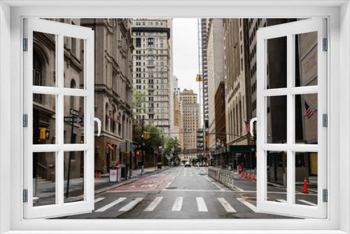 Fototapeta Naklejka Na Ścianę Okno 3D - New York City streets. Manhattan streets. New York buildings and architectures. Close up view. Rentals in New York city. Rainy day in Manhattan. 
