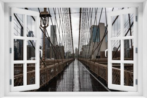 Fototapeta Naklejka Na Ścianę Okno 3D - Brooklyn bridge. Rainy Brooklyn bridge view. Brooklyn bridge close up view. Rainy day at Brooklyn bridge. 