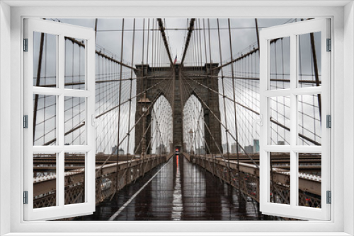 Fototapeta Naklejka Na Ścianę Okno 3D - Brooklyn bridge. Rainy Brooklyn bridge view. Brooklyn bridge close up view. Rainy day at Brooklyn bridge. 