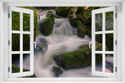 Fototapeta Naklejka Na Ścianę Okno 3D - White water torrent between Mossy rocks