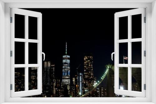 Fototapeta Naklejka Na Ścianę Okno 3D - Brooklyn bridge during nighttime american flag