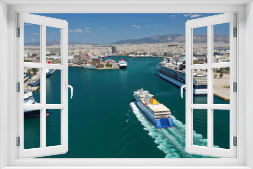 Fototapeta Naklejka Na Ścianę Okno 3D - Aerial drone photo of passenger ferry reaching destination - busy port of Piraeus, Attica, Greece