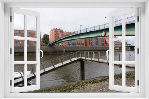 Fototapeta Naklejka Na Ścianę Okno 3D - Bremen - Stadtlandschaft mit Brücke über die Weser