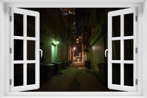Fototapeta Naklejka Na Ścianę Okno 3D - Dark and eerie urban city alley at night
