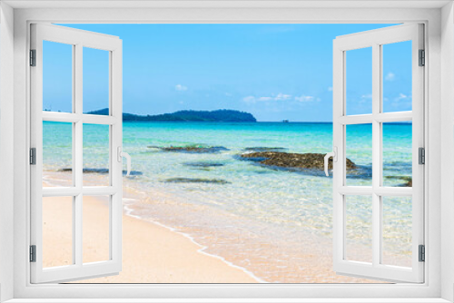 Fototapeta Naklejka Na Ścianę Okno 3D - Tropical beautiful beach sand and sea with wave reaching shore with blue sky and white clouds, summer travel or vacation concept