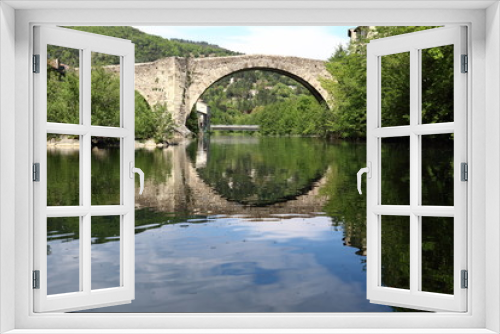Fototapeta Naklejka Na Ścianę Okno 3D - old bridge over the river in Le Vigan, France