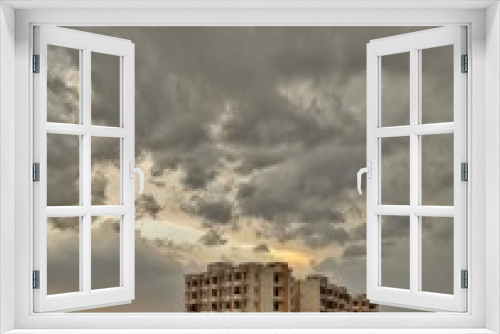 Fototapeta Naklejka Na Ścianę Okno 3D - Dark clouds over the city