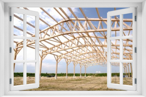 Fototapeta Naklejka Na Ścianę Okno 3D - Construction d'un batiment agricole à ossature bois