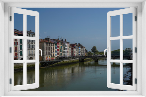 Fototapeta Naklejka Na Ścianę Okno 3D - The city of Bayonne in France with buildings in the Nive River
