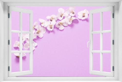 Fototapeta Naklejka Na Ścianę Okno 3D - viola flowers on color paper  background