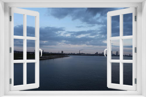 Fototapeta Naklejka Na Ścianę Okno 3D - SUNSET OVER THE WATER, CITY VIEW