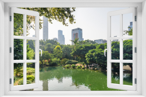 Fototapeta Naklejka Na Ścianę Okno 3D - Gorgeous morning view of Bird Lake at Kowloon Park
