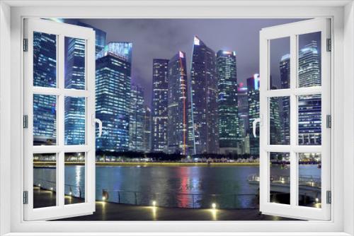 Fototapeta Naklejka Na Ścianę Okno 3D - Singapore Finance District City Skyline and Waterfront at Night