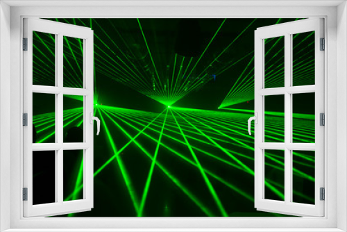 
laser beam lights at a party with various colors