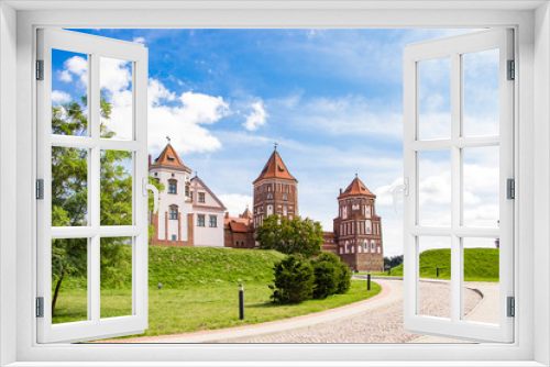 Fototapeta Naklejka Na Ścianę Okno 3D - Mir, Belarus. Beautiful medieval castle on a background of blue sky. Summer landscape, ancient architecture.