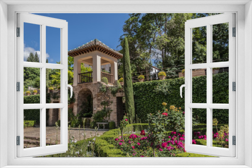 Fototapeta Naklejka Na Ścianę Okno 3D - Beautiful garden with fountain in Granada Alhambra. Granada, Andalusia, Spain.