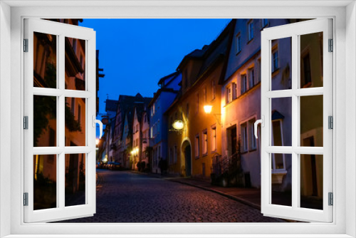 Fototapeta Naklejka Na Ścianę Okno 3D - Night view to narrow medieval street in old town Rothenburg ob der Tauber, Bavaria, Germany. November 2014