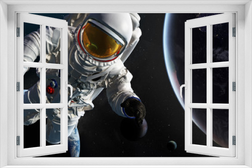 Fototapeta Naklejka Na Ścianę Okno 3D - Astronaut at spacewalk. Concept of conquering the universe by the human race. Elements of this image furnished by NASA