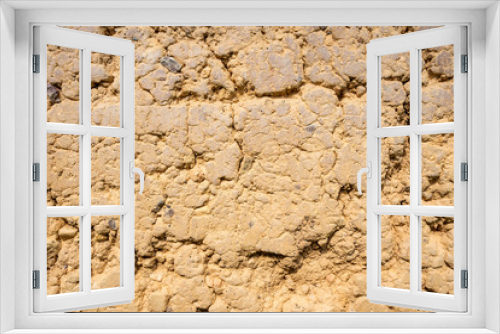 Fototapeta Naklejka Na Ścianę Okno 3D - Clay wall texture surface of the old house in countryside walls made of clay is popular in rural mountain areas in Asia. Concept textured space building background