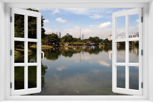 Fototapeta Naklejka Na Ścianę Okno 3D - Kuala Lumpur, Malaysia- 30 December 2019; view of Ampang Hilir Lake Garden located at Desa Pahlawan, Kuala Lumpur