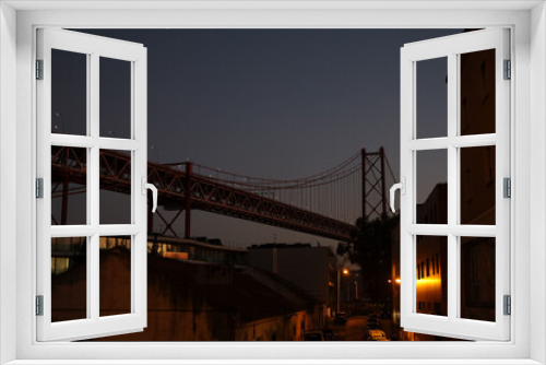Fototapeta Naklejka Na Ścianę Okno 3D - Night view of the bridge April 25 from Lisbon city