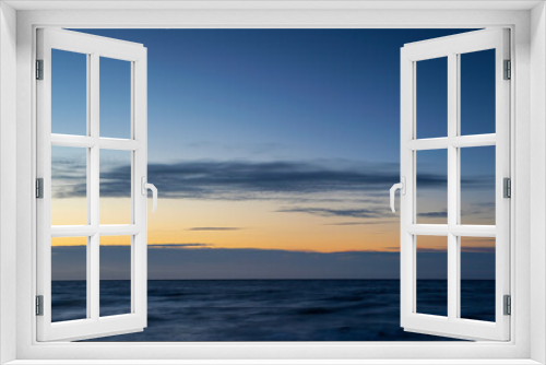 Fototapeta Naklejka Na Ścianę Okno 3D - Winter Sunset With Cloudy Horizon, Long Exposure