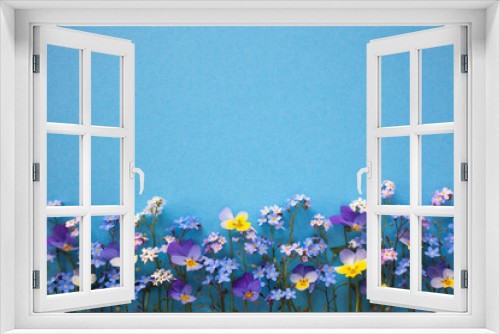 Fototapeta Naklejka Na Ścianę Okno 3D - Paper background with colorful forget-me-not flowers and pansies. Space for text, congratulations.