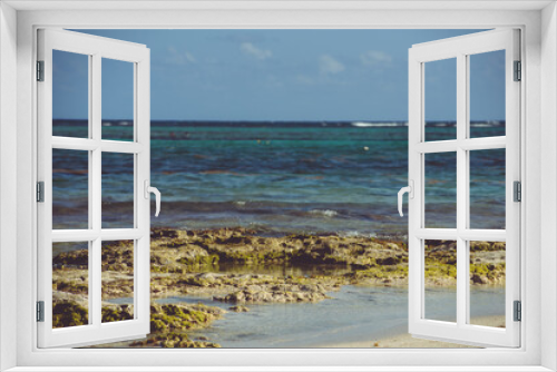 Fototapeta Naklejka Na Ścianę Okno 3D - Akumal is one of the most peaceful places in the Riviera Maya, one protected shallow bay with a secluded beach and a nearby reef,  fascinating tourists from around the world