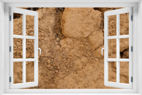 Fototapeta Naklejka Na Ścianę Okno 3D - Texture of dry soil, closeup view